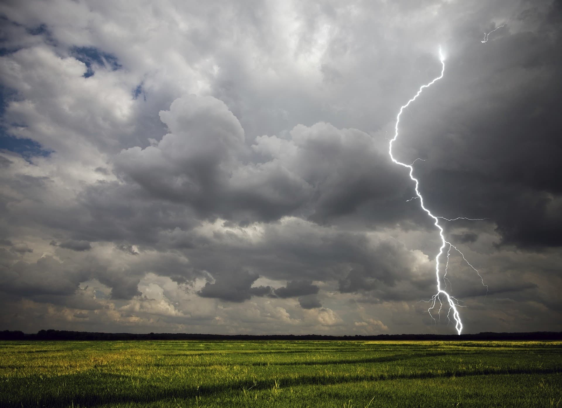 Lightning striking a field